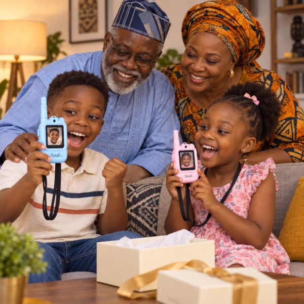 Nigerian grandparents gifting SmartieKids video walkie-talkies to their grandchildren